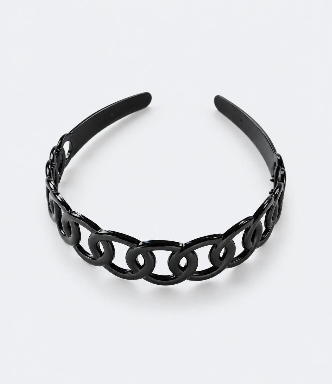 Svart diadem med länkade ringar